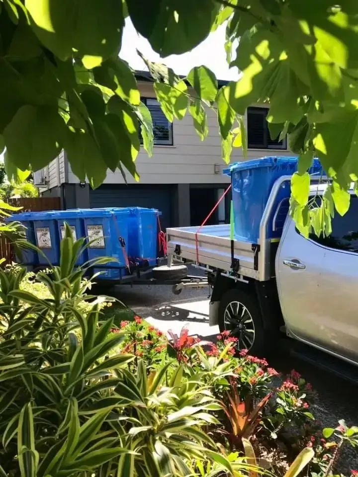Blondies Bins truck pulling a trailer of garden bins Blondies Bins truck pulling a trailer of garden bins